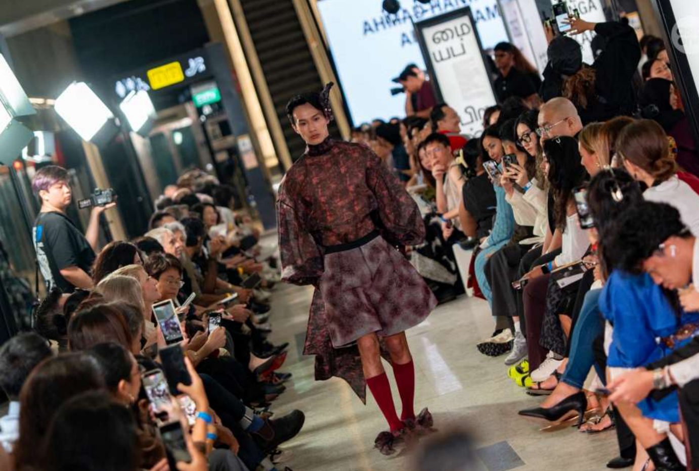 LASALLE Graduation Show runway inside an MRT station